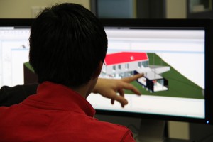 A student modeling a building
