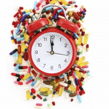 Clock surrounded by medication